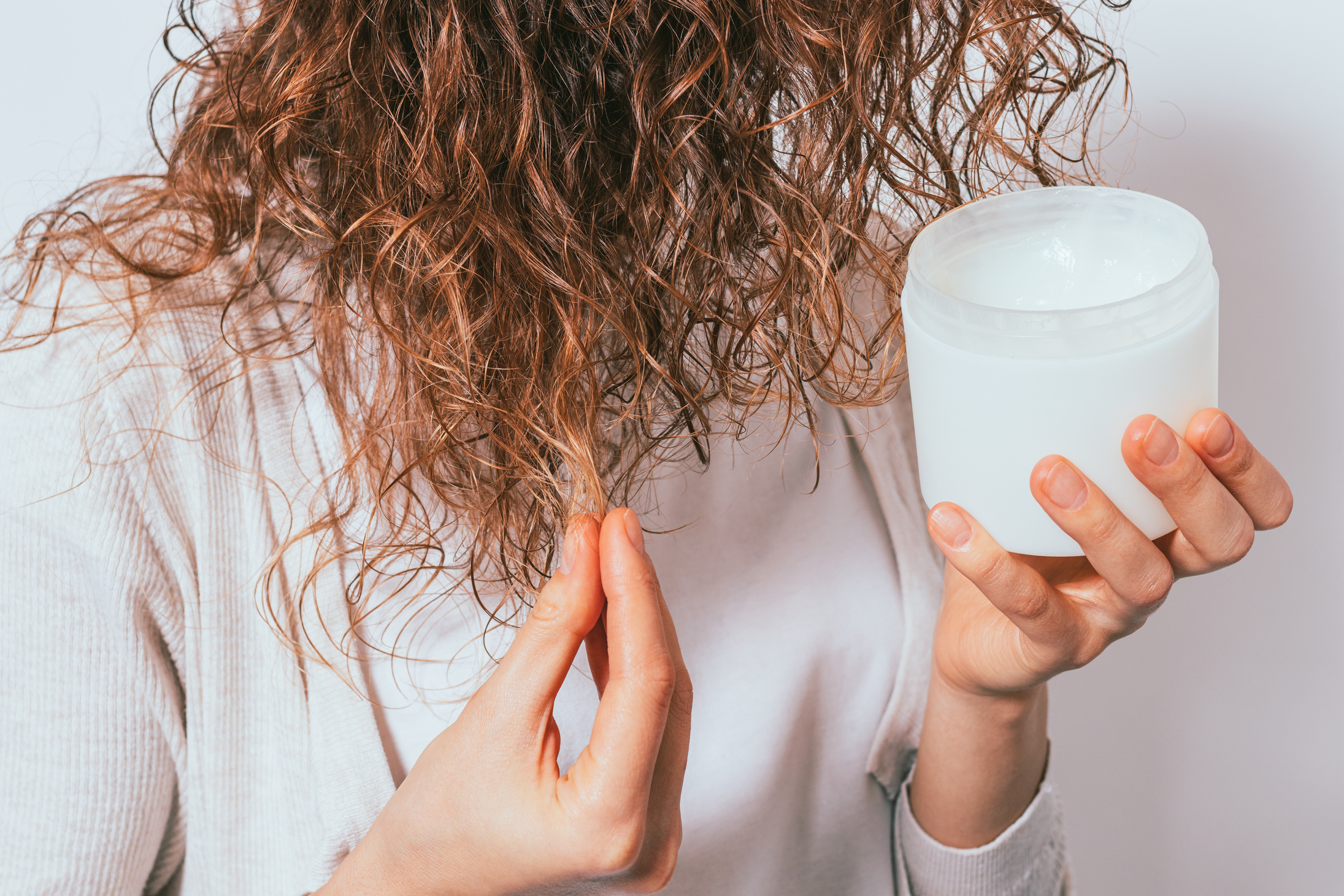 Applying Coconut Cream on Hair 